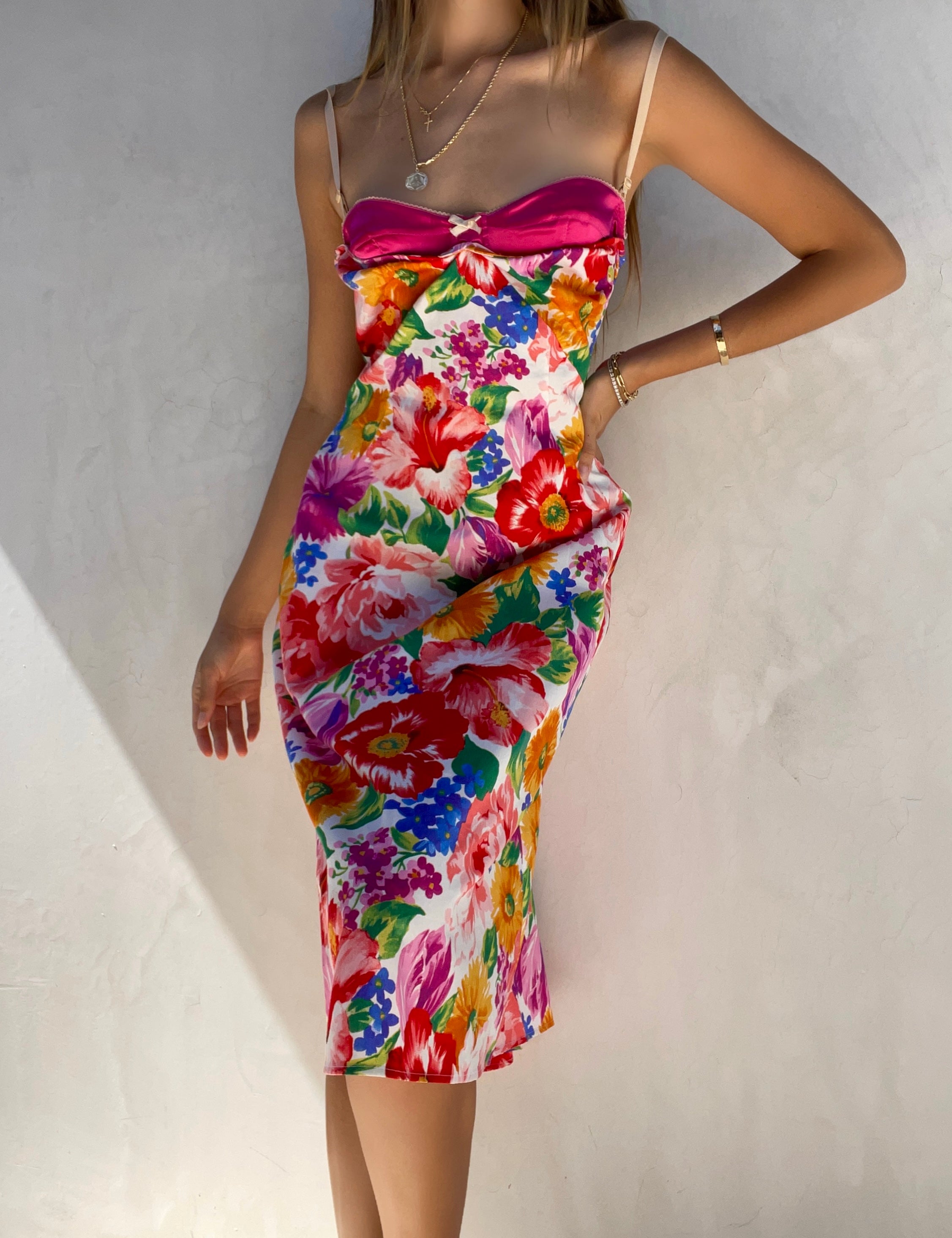 90s dolce and gabbana dress Our Dolce & Gabbana 1990s Lace & Silk Bow dress is so classic& elegant.  Whether you are looking for a wedding dress on the modest side, or just  appreciate a traditional look, this dress has you